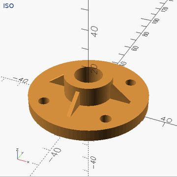 The flange from earlier with gussets added around its boss and a bigger bore.