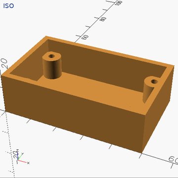An open tray with screw posts in its corners.