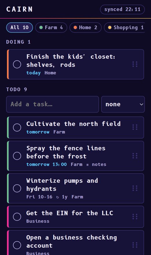 The Cairn app on a phone at night: Doing and Todo cards with coloured category stripes